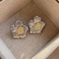 Two Tone Sculpted Flower Stud Earrings With Yellow Centers view 5