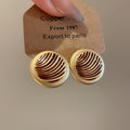 Striped Round Stud Earrings in Silver and Gold with Polished Details view 7