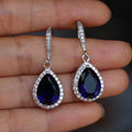 Silver Tone Teardrop CZ Halo Drop Earrings Purple Blue Clear view 3