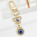 Gold Crystal Evil Eye Keychain With Butterfly And Bear Charm view 9