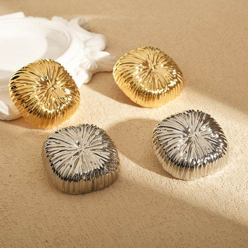 Radiating Square Statement Stud Earrings shown from an angled view