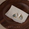 Gold Tone White And Blue Green Leaf Cluster Stud Earrings view 3