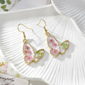 Gold Butterfly Resin Dried Flower Drop Earrings Four view 3