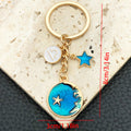 Six Blue Zodiac Moon and Star Metal Keychain Designs view 11