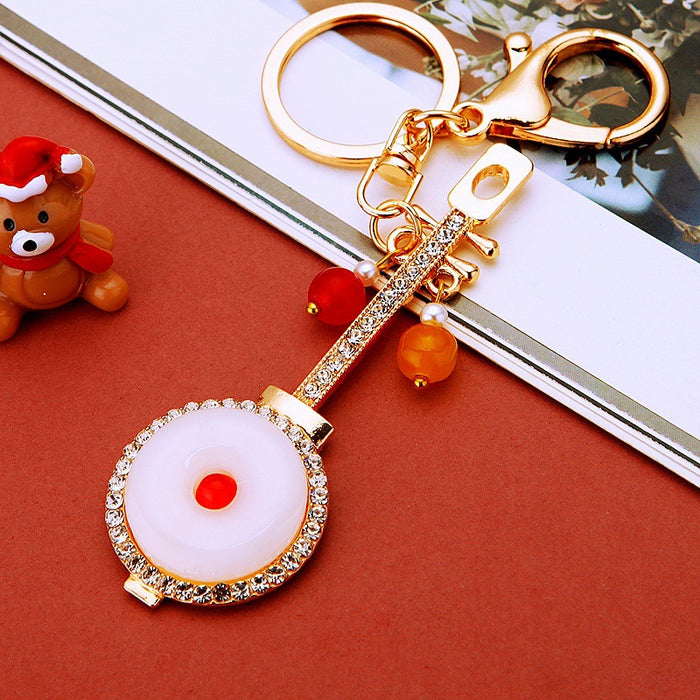 Round Jade Look Pipa Keychains in Red and Green Color Options