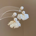 White Floral Stud and Pearl Drop Earrings in Two Styles view 7