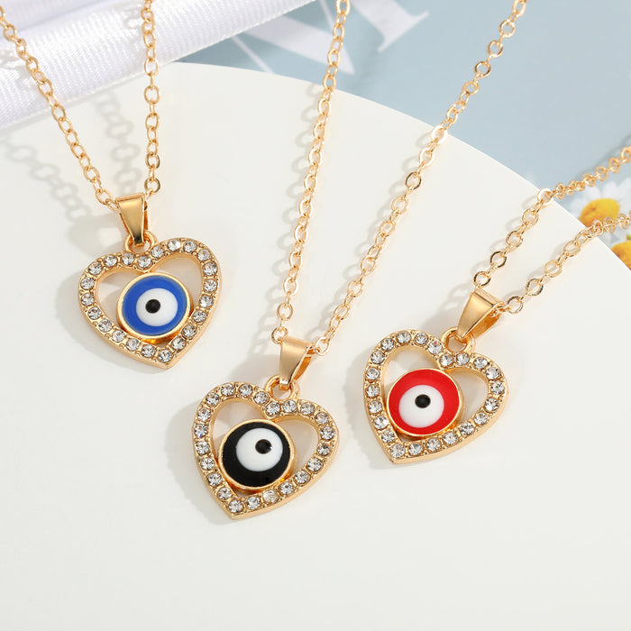Gold Tone Heart Crystal Evil Eye Pendant Necklaces in Three Colors