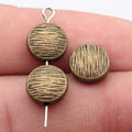 Woodgrain Texture Flat Round Metal Beads in Three Finishes view 3