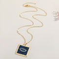Gold Tone Textured Square Evil Eye Pendant Necklaces in Five Colors view 3