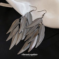 Layered Metal Leaf Tassel Hook Earrings in Three Tones view 4