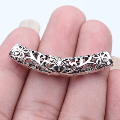Open Floral Curved Tube Bracelet Connector shown in hand