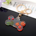 Transparent Resin Pressed Flower Dog Bone Clip Keychains in Three Colors view 6