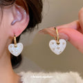 Gold Tone Crystal Heart Drop Huggie Earrings in Two Colors view 4