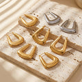 Tapered Open Center Hoop Earrings in Gold and Silver Tone view 3