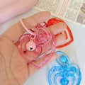 Translucent Nested Heart Bell Charms in Five Bright Colors view 4
