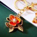 Enamel Camellia Flower Keychains in Red, Orange and Purple view 2