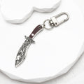 Silver Tone Faux Woodgrain Knife and Cleaver Clip Keychains view 2