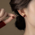Red Enamel Horse Stud Earrings with Gold Tone Details view 2