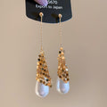 White Teardrop Gold Tone Chain Tassel Stud Earrings view 3