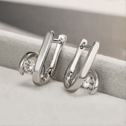 Detail view 2 of folded-bar studs with clear stone tips