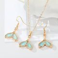 Gold Tone Aqua Glitter Mermaid Tail Necklace and Hook Earrings view 1