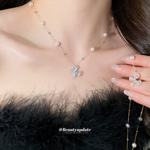 Pearl Station Necklace with Cubic Zirconia Flower Pendant, Two Finishes