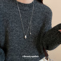 Silver Teardrop Slider Necklace With Polished Metal Tone Details view 3
