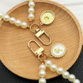 Pearl Loop Rose Medallion Bag Charms in White and Pink view 2