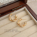 Gold Polished Twisted Ribbon Open Hoop Stud Earrings view 1