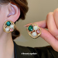 Gold Tone Oval Stud Earrings With Colorful Crystal Accents view 4