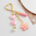 Pink Heart Clasp Keychain with Iridescent Hearts and Glitter Flower Charm view 6