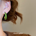 Glossy Green Curved Hoop Stud Earrings with Rounded Profile view 3