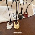 Open Oval Cord Pendant Necklace in Red and Silver Tones view 4