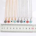 Round Evil Eye Pendant Necklaces in Ten Gold and Silver Tone Designs view 2