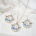 Pressed Flower Winged Ghost Necklace, Earrings and Coordinated Set view 1