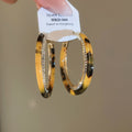 Two Tone Oval Hoop Earrings With Crystal Trim and Colored Inlays view 6