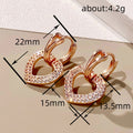 Rose Gold Tone Open Heart Crystal Huggie Earrings Polished Metal Jewelry view 4