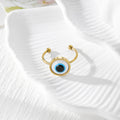 Blue Evil Eye Stud Earrings and Adjustable Rings in Four Finishes view 8