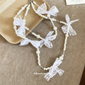 White Lace Bow and Faux Pearl Necklace with Decorative Details view 2