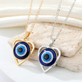 Heart Outline Blue Evil Eye Pendant Necklaces in Two Finishes view 1