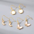 Gold Tone Long Crystal Hook Earrings with Geometric Charms view 1