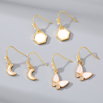 Gold Tone Long Crystal Hook Earrings with Geometric Charms