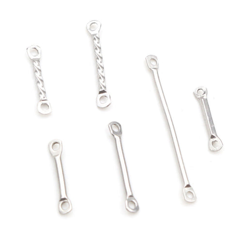 Silver Tone Double Loop Connector Bars in Six Textures and Sizes, grouped overview on a plain background