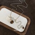 Silver Tone Chain Necklace with Brown Vase Pendant view 2