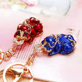 Red Enamel Pixiu Keychain with Gold Tone Scrollwork and Crystal Detail view 2
