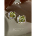 Silver Tone Pale Yellow Cushion Stone Clear Halo Stud Earrings view 1