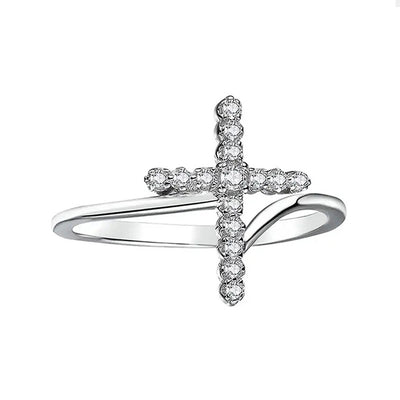 Silver pavé CZ cross open band ring on white background product shot