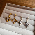 Antique Tone Iris Flower Stud Earrings in Gold and Silver view 2