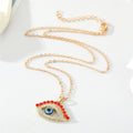 Gold and Silver Tone Red Crystal Lash Eye Pendant Necklaces view 2