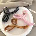 Marbled Loop Acrylic Hair Claw In Pale Pink Or Black view 2
